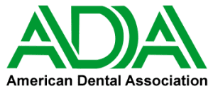 ADA Logo - Stylized tooth within a blue circle representing the American Dental Association.