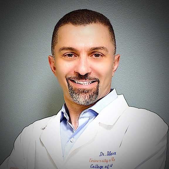 Dentist In The Villages Florida .A warm and genuine smile from Dr. Ammar Mouse, a dedicated dentist in The Villages, Florida, radiating professionalism and care.